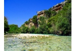 Acheron River in Greece Figure 2. Acheron River in Greece, identified in the study as one of the habitats of the highest-ranked fish species based on their susceptibility to climate change  © Oliver Deisenroth (CC BY-SA 3.0).